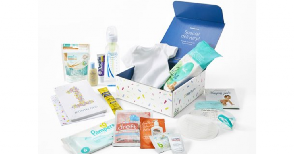 walmart baby box with baby samples, onesie, Pampers wipes, Dreft sample, and a baby bottle