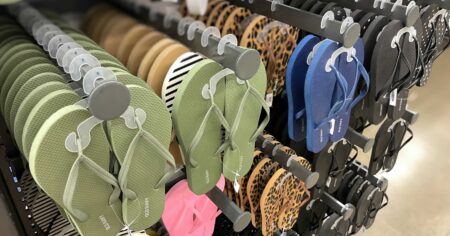 flip flops hanging on pegs in store