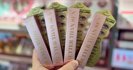 hand holding up a handful of mascara