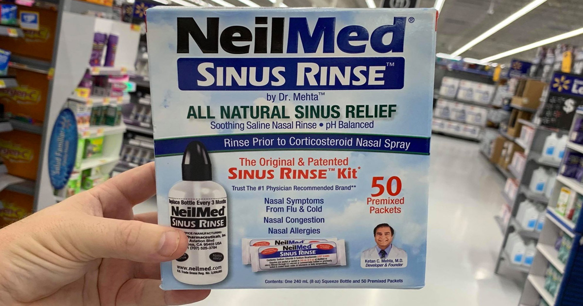 neilmed hand holding neilmed sinus rinse kit