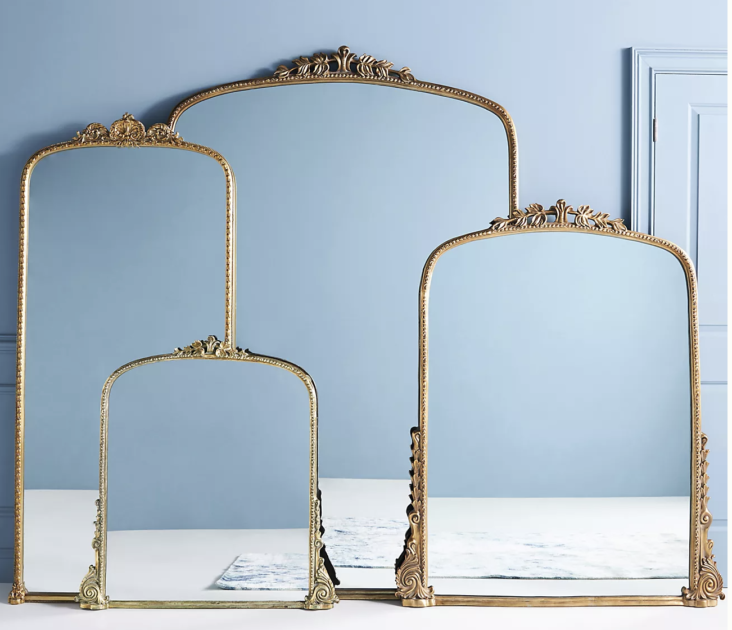 group of gold mirrors