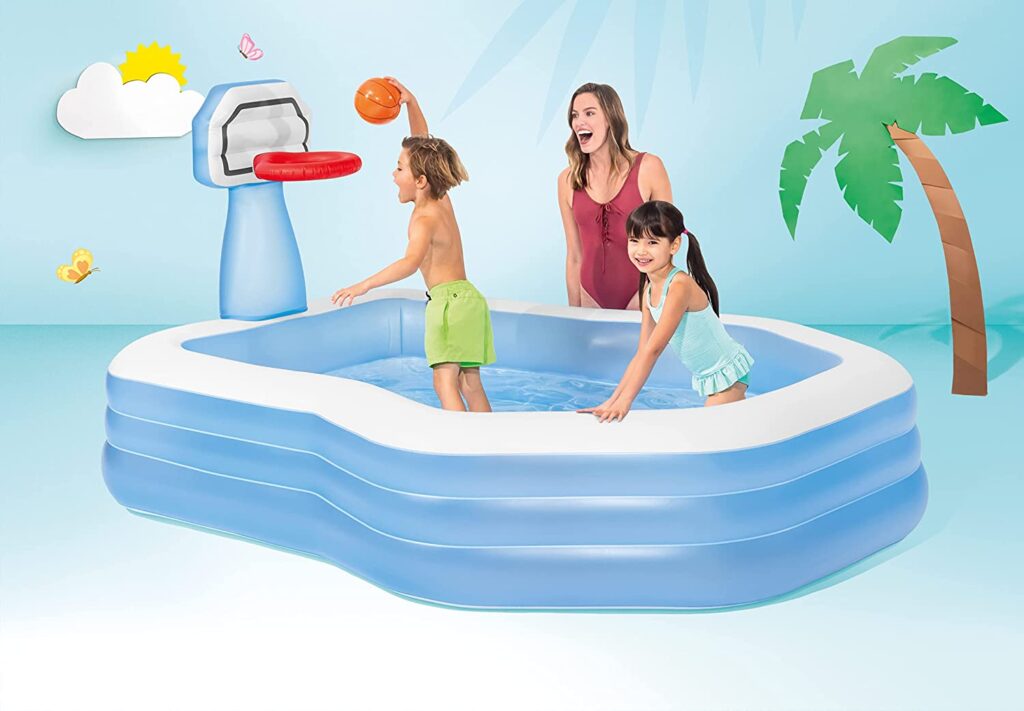 children swimming in intex pool center