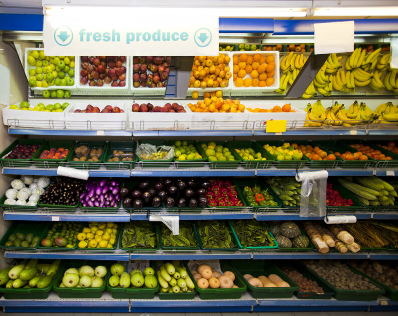 store shelves with fresh produce on them