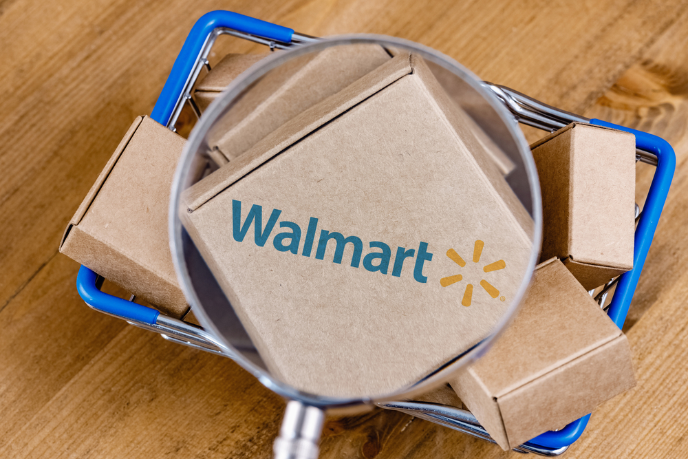 magnifying glass looking at walmart boxes
