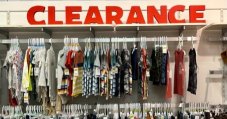 display of clothing at Carter's with a clearance sign