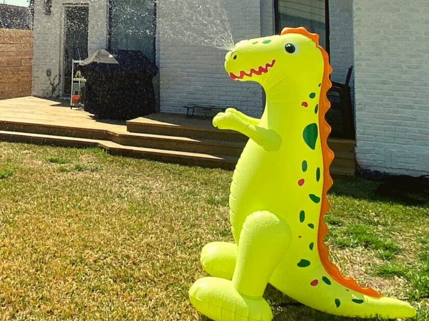 Float Joy Giant Foot Sprinkler Inflatable Dinosaur