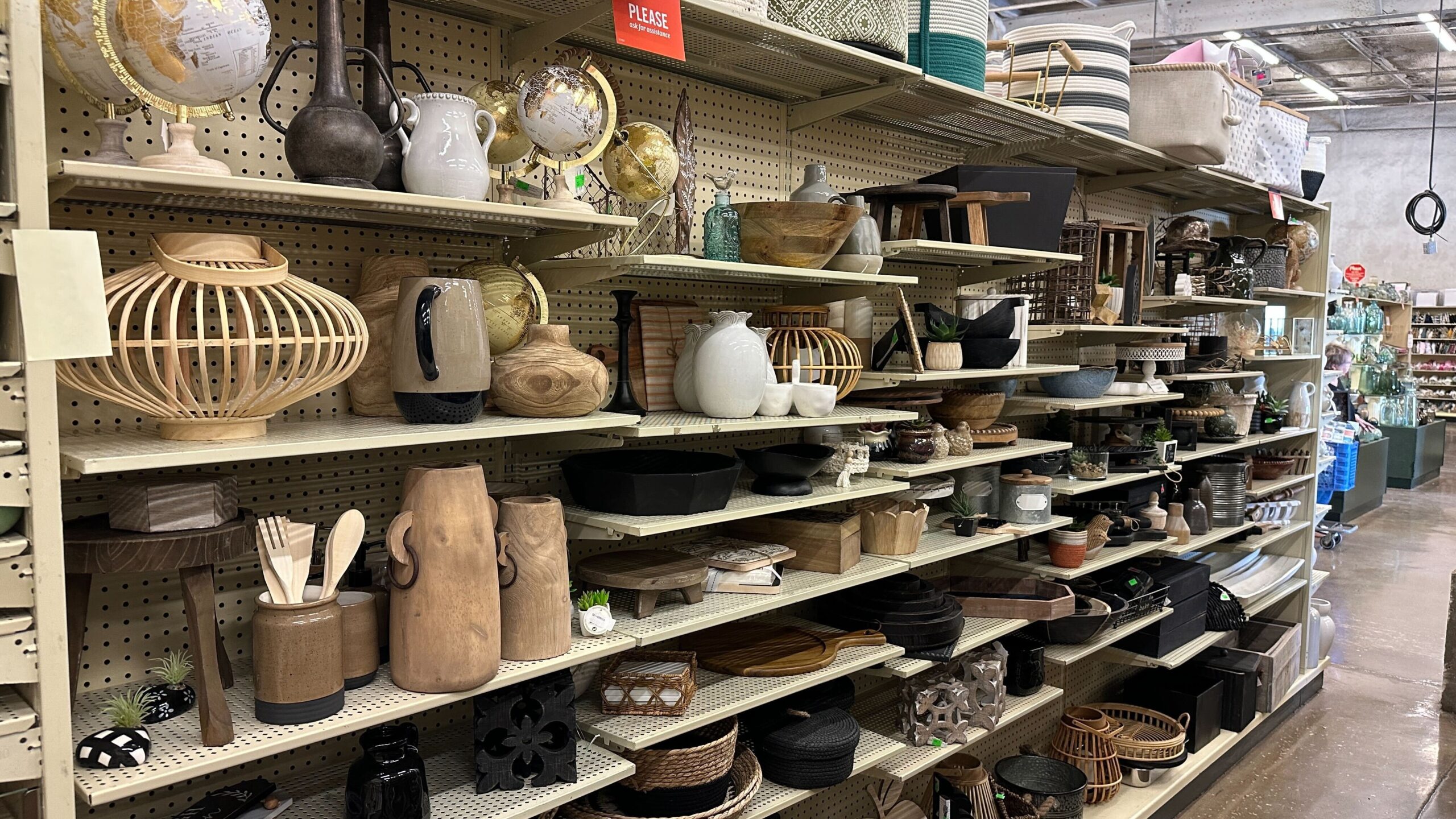 Shelves Full of Baskets and pottery at the Basket Market - The Freebie Guy