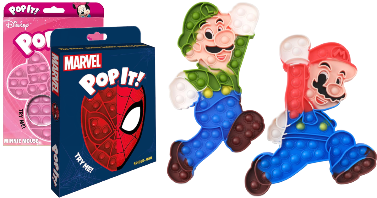 two Pop It Toys boxes and two toys next to them