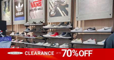 Tilly's Shoe Wall Features Various Converse, Vans, Crocs, and Nikes during 70% Clearance Sale