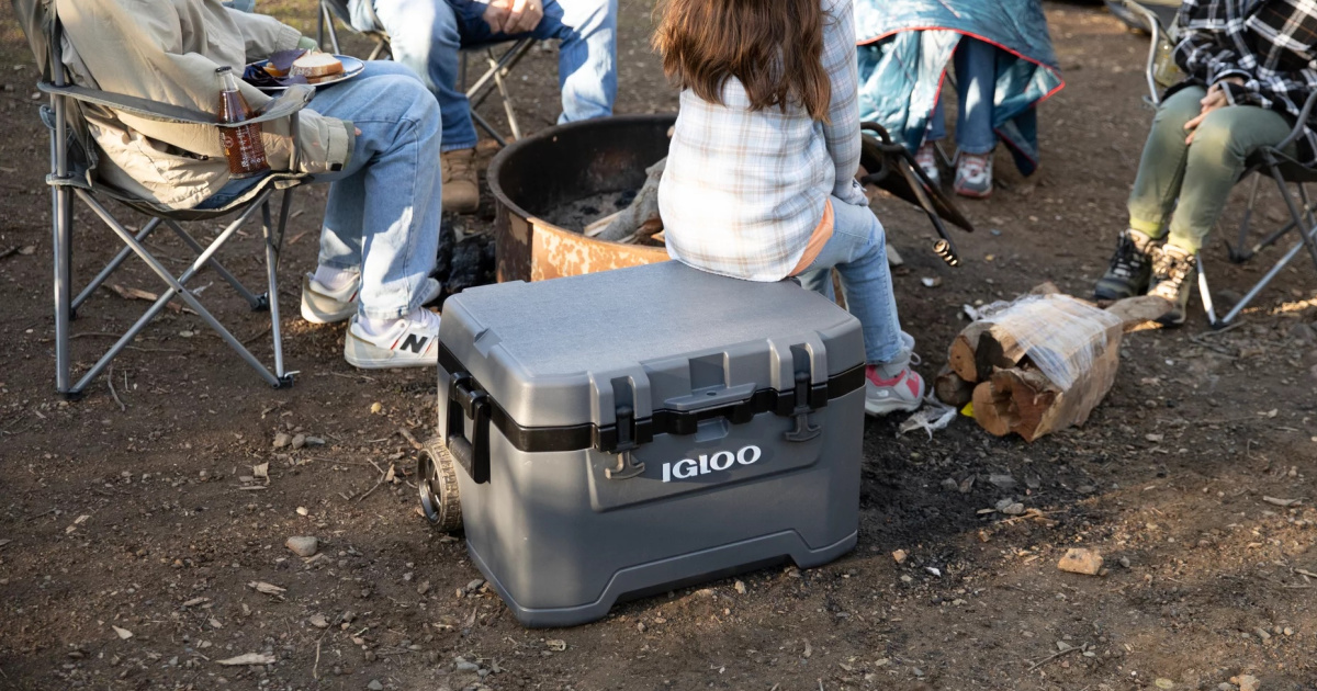 girl sitting on Igloo Cooler