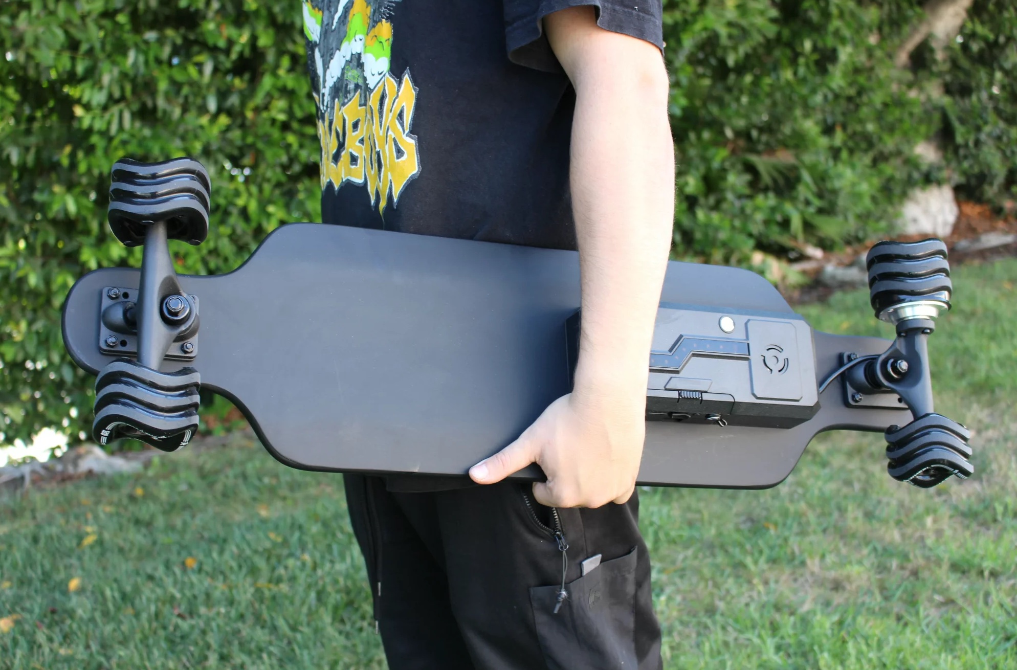 kid holding Shark Board 