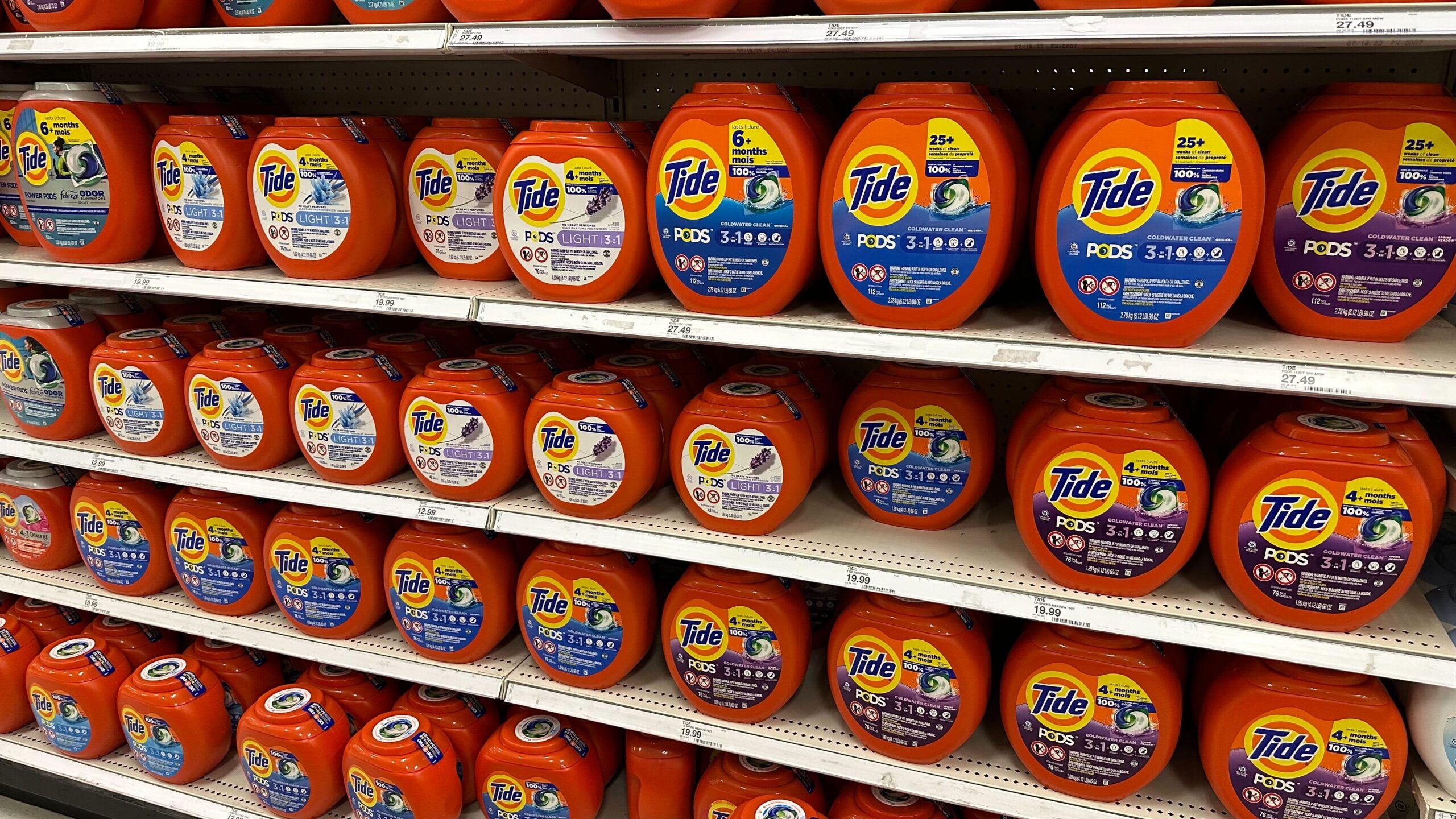 Laundry Tide Downy row of Tide pods on a shelf