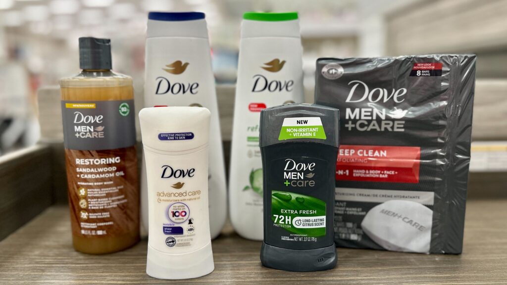 Dove body wash, deodorant, and bar soap on a table