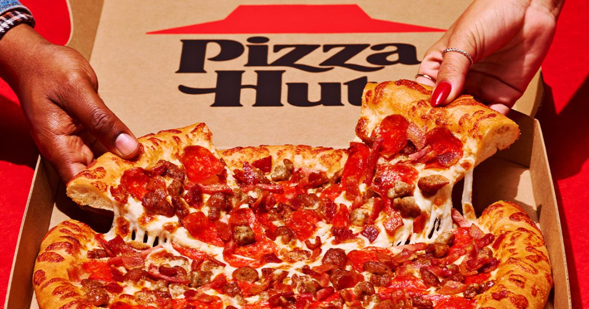 Pizza Hut box with meat lovers pizza - Pizza Hut Coupons - The Freebie Guy