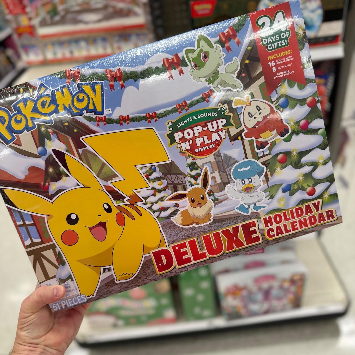 hand holding up pokemon advent calendar - The Freebie Guy