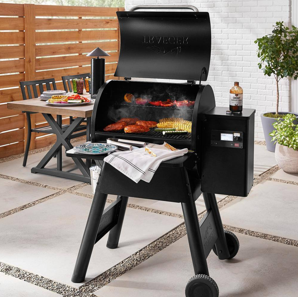 Traeger Pro 575 Wifi Pellet Grill and Smoker Traeger grill with food on it