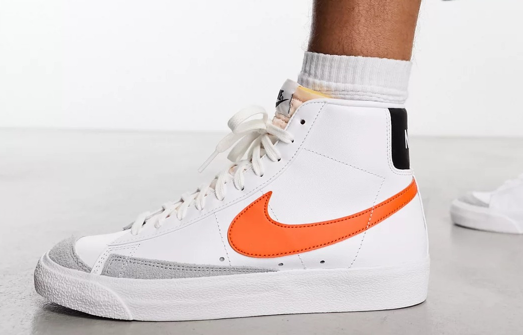 Nike Blazer Mid sneakers in white and orange