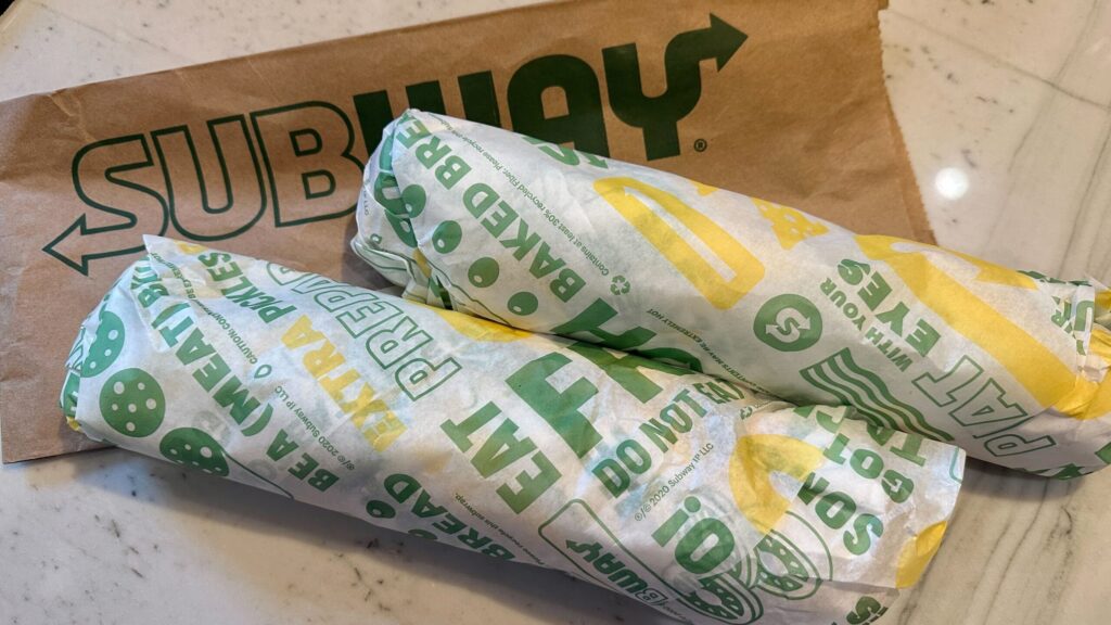 two subway footlong sandwiches bought using subway coupons & promo codes