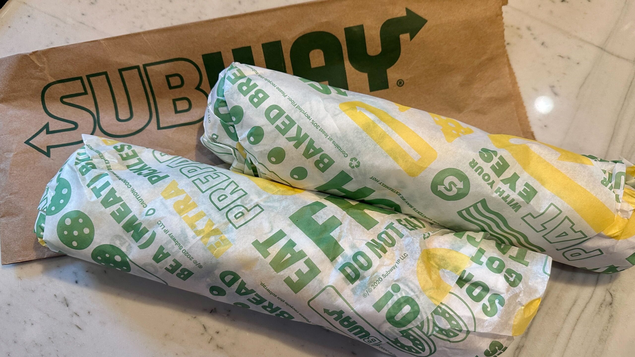two subway footlong sandwiches