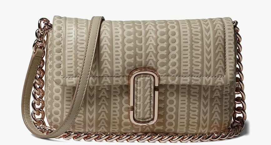 tan bag with Marc Jacobs on it