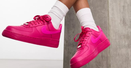 Person Wearing Mid-Rise Socks & Bright Pink Nike Shoes on Sale