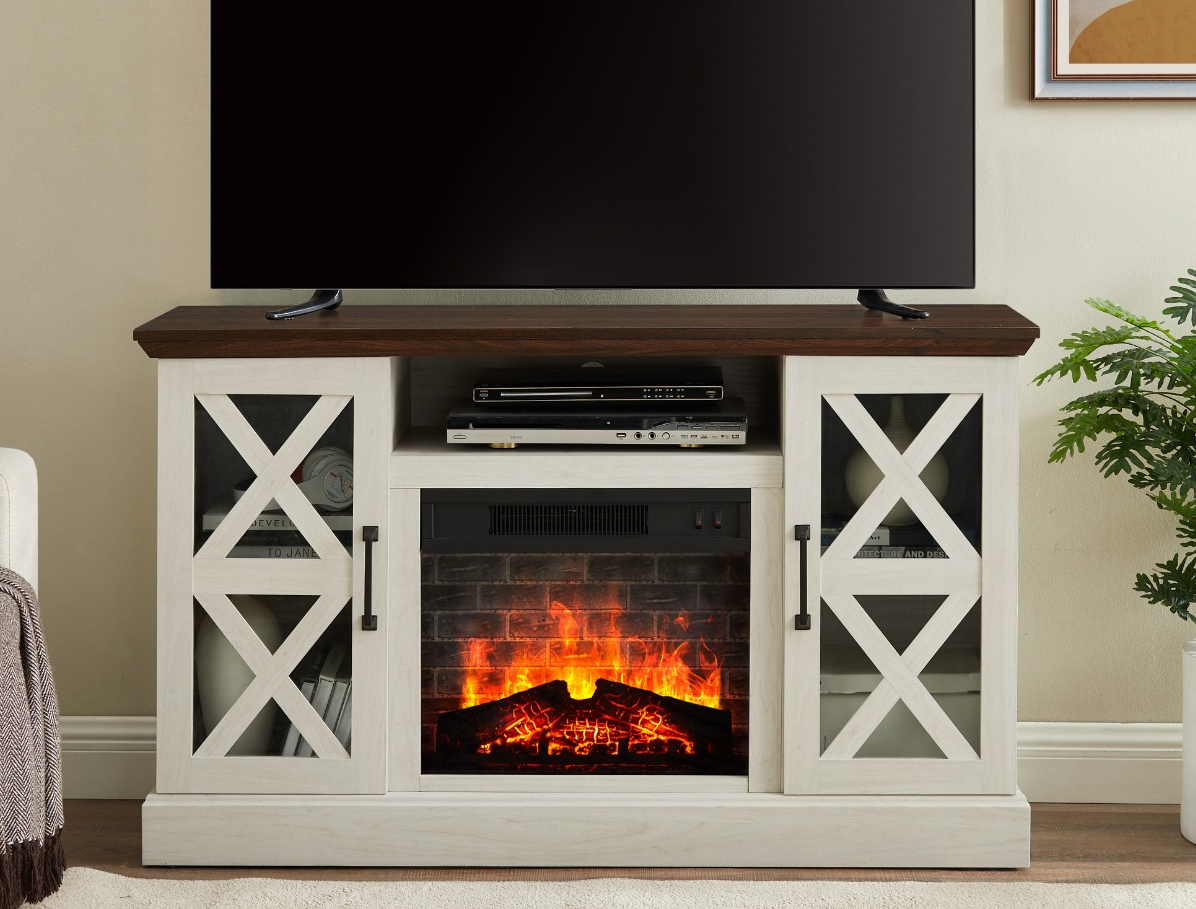 white TV stand with a fireplace in the middle and a TV on top