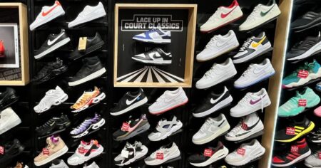 nike shoes on display on store wall