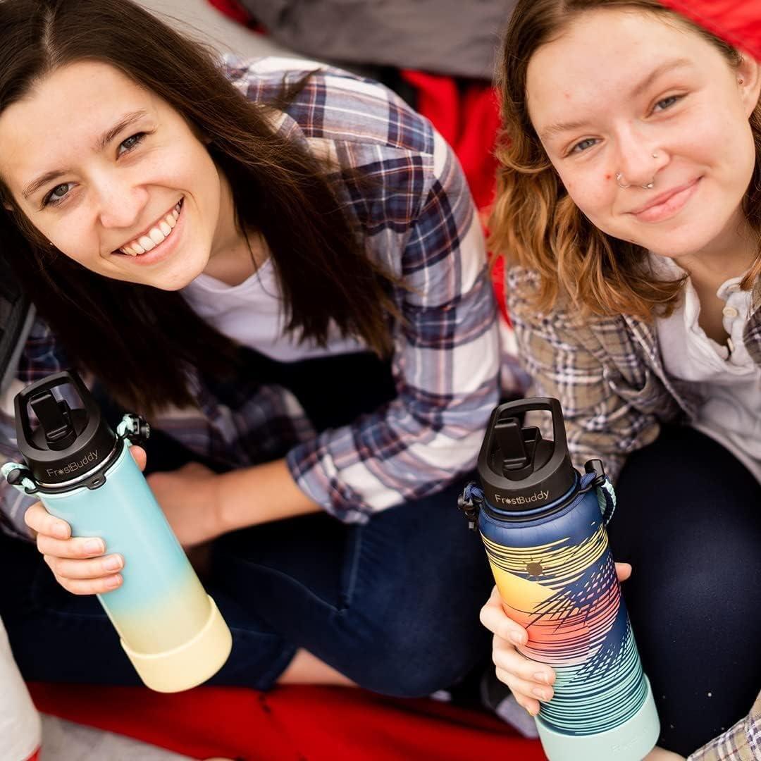 two women smiling at the camera holding Frost Buddy water bottles