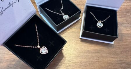heart pendant necklaces on counter
