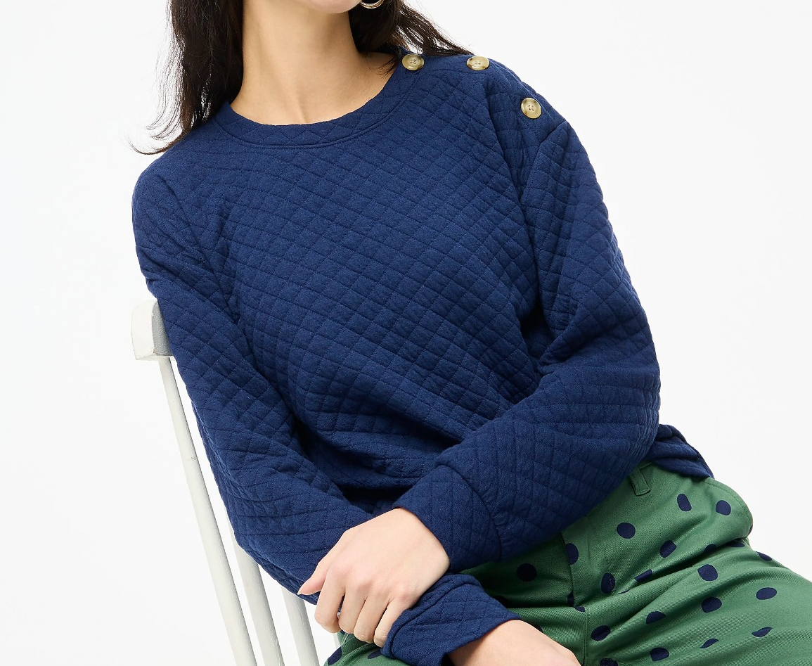 woman in a dark blue sweatshirt
