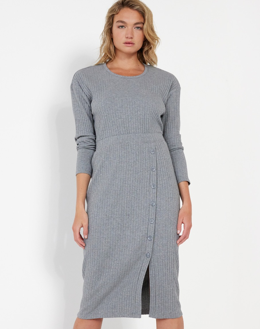 woman in a matching grey skirt and sweater