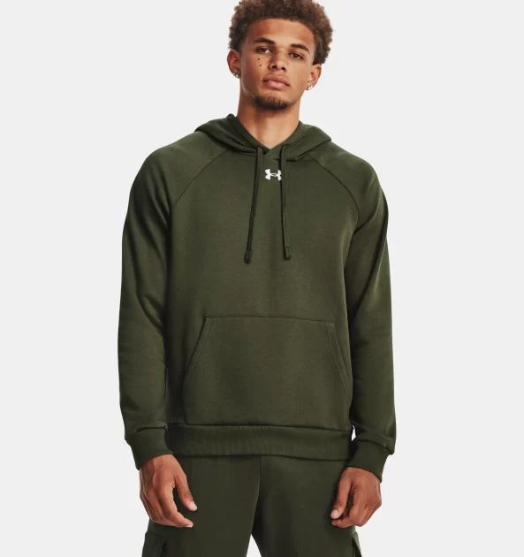 man wearing hunter green under armor hoodie