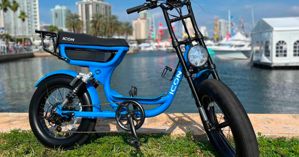 icon e bike in blue in front of water