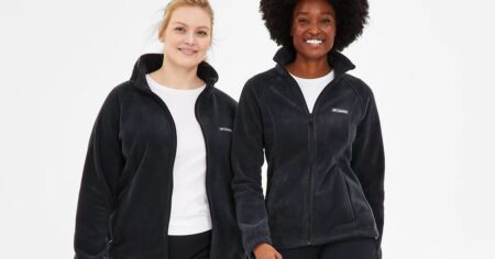 two women wearing fleece jackets