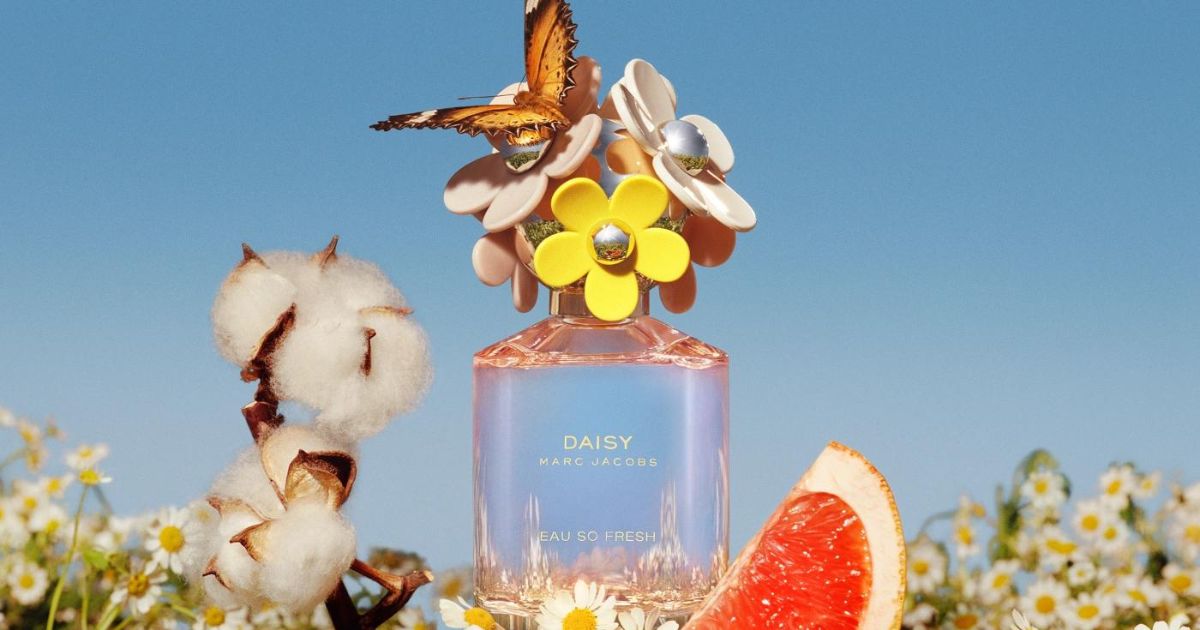 Marc Jacobs Daisy Eau So Fresh with flowers and fruit around it
