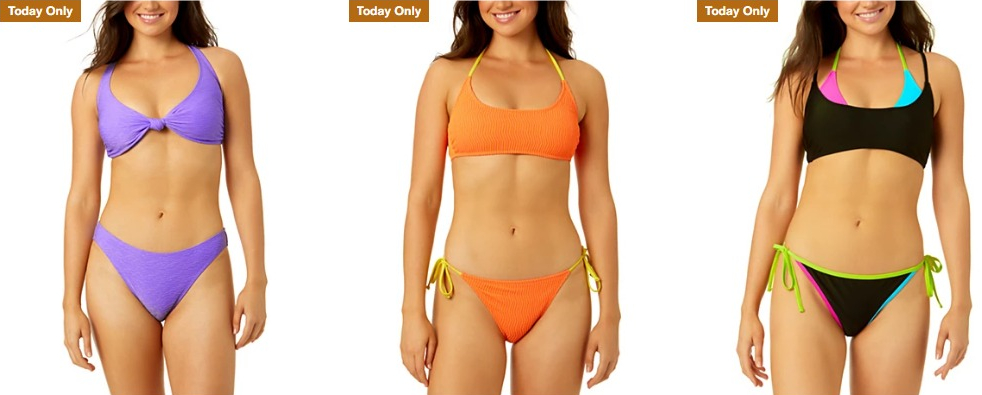 three women wearing bikinis