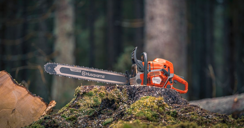 husqvarna chainsaw on a tree stump