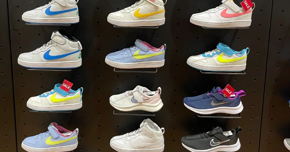 nike wall of shoes Nike shoes displayed on a store wall