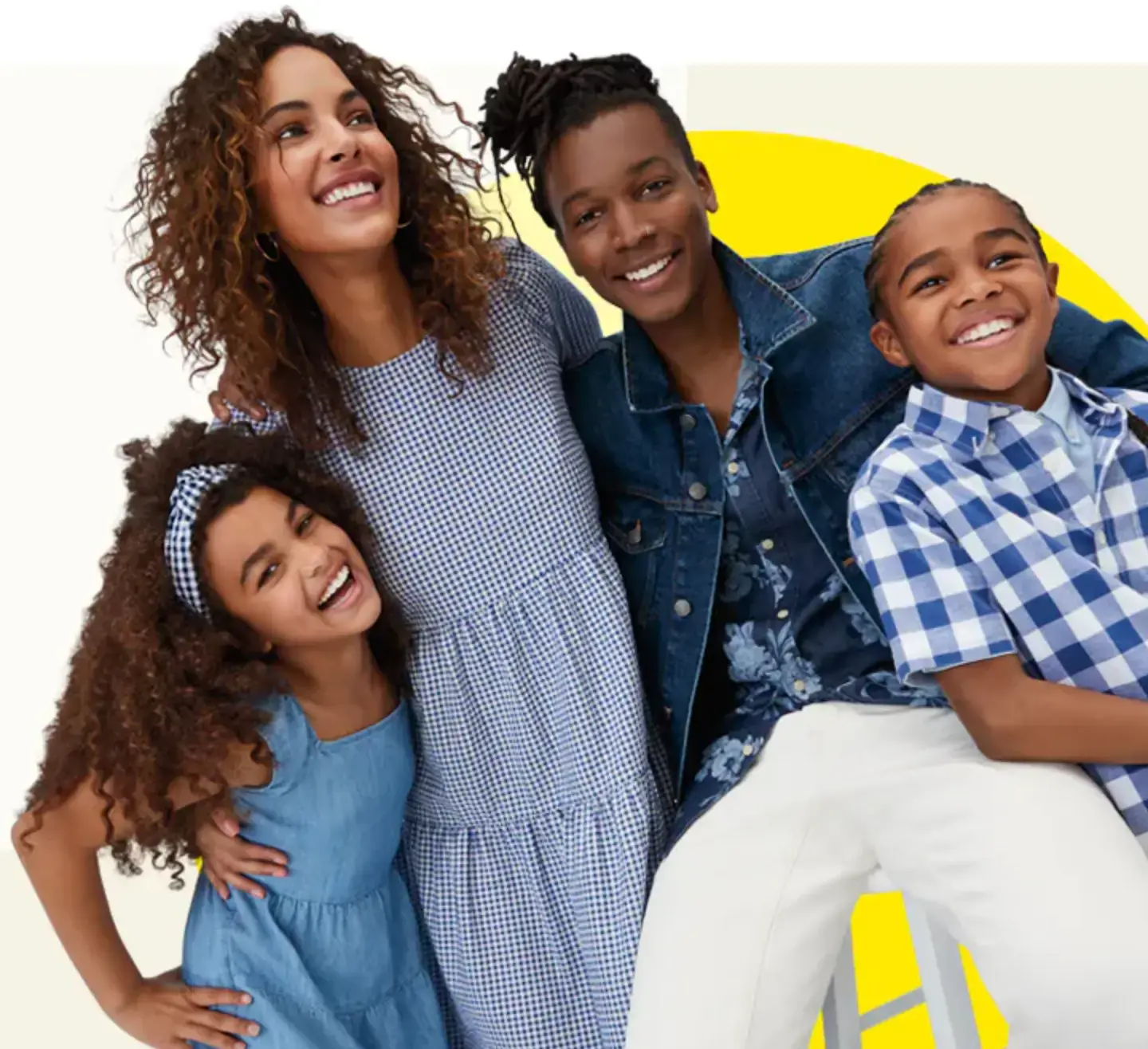 old navy image with african american family hugging old navy image with african american family hugging