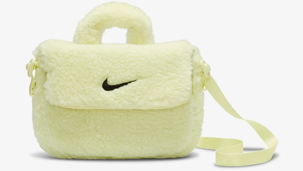 yellow Nike bag with black logo