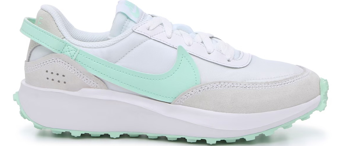 white Nike sneaker with light blue and grey accents