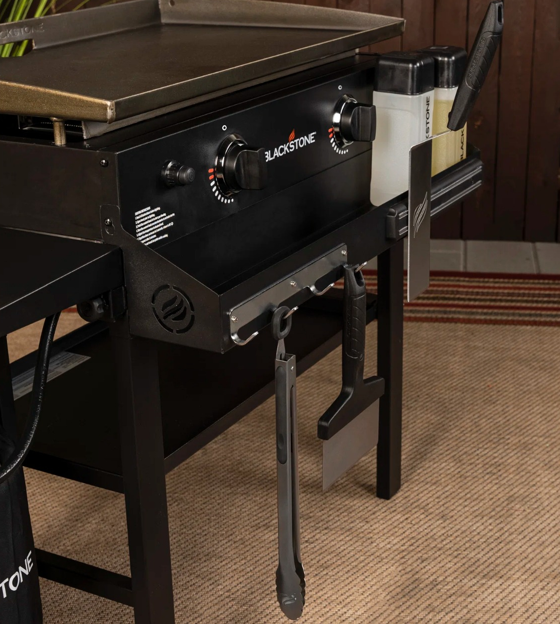 Blackstone 28 Griddle with Front Shelf and Soft Cover Blackstone grill with tools on the front