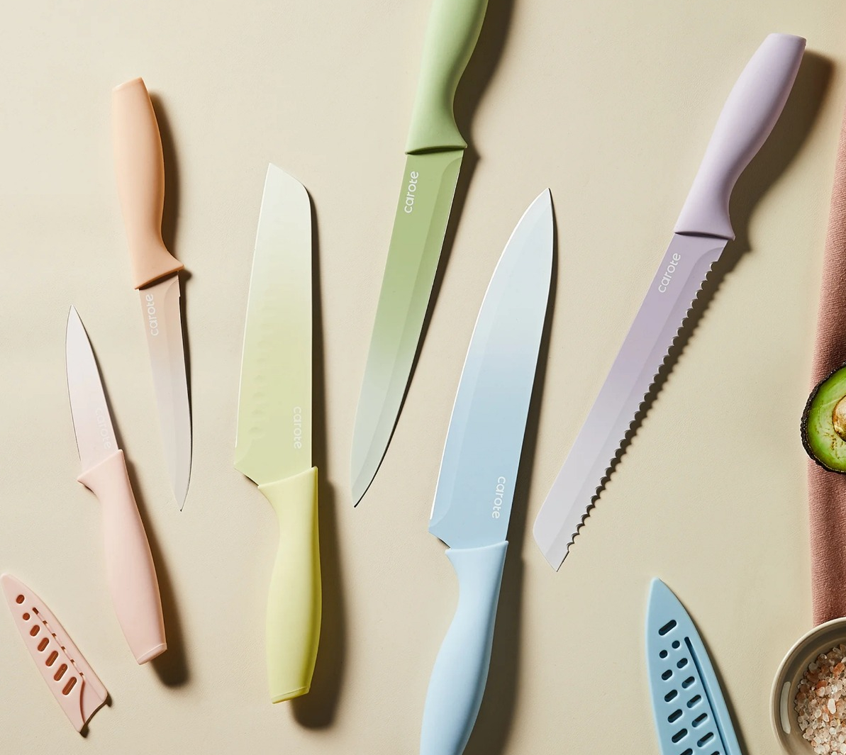 CAROTE 12Pcs Kitchen Knife Set pastel colored knives on a table