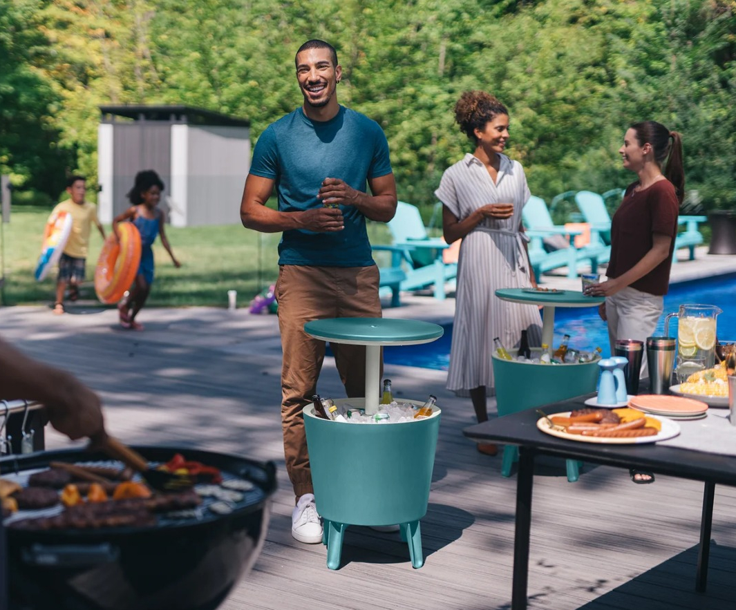 Keter Qt Cool Bar Cooler man standing next to an outdoor cooler