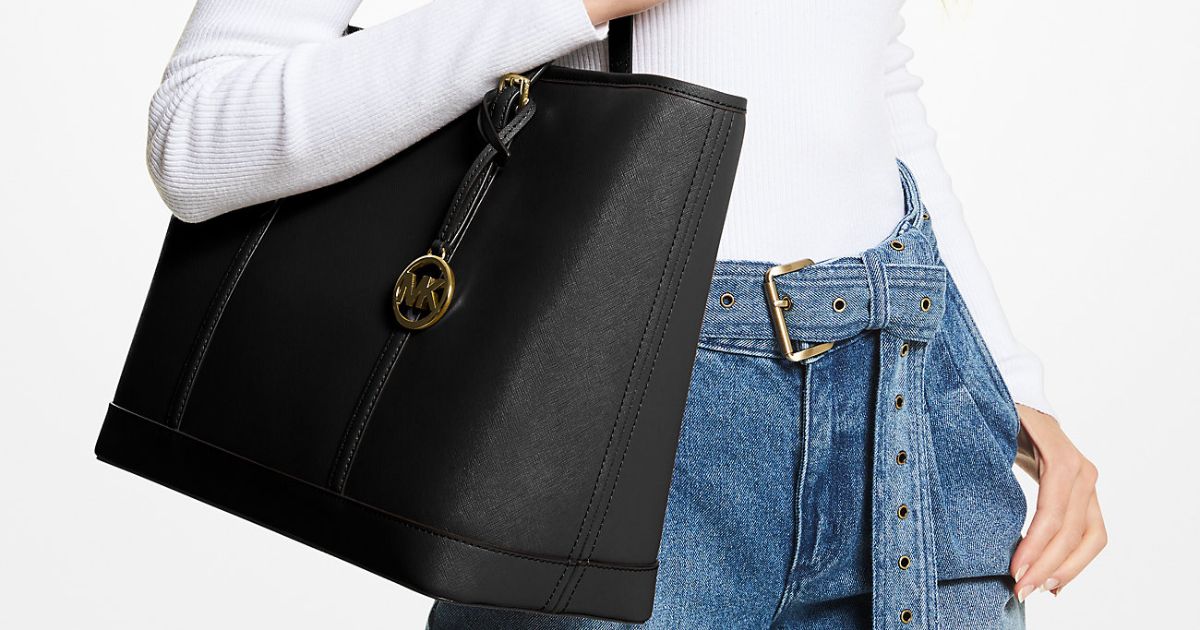 woman holding a tote