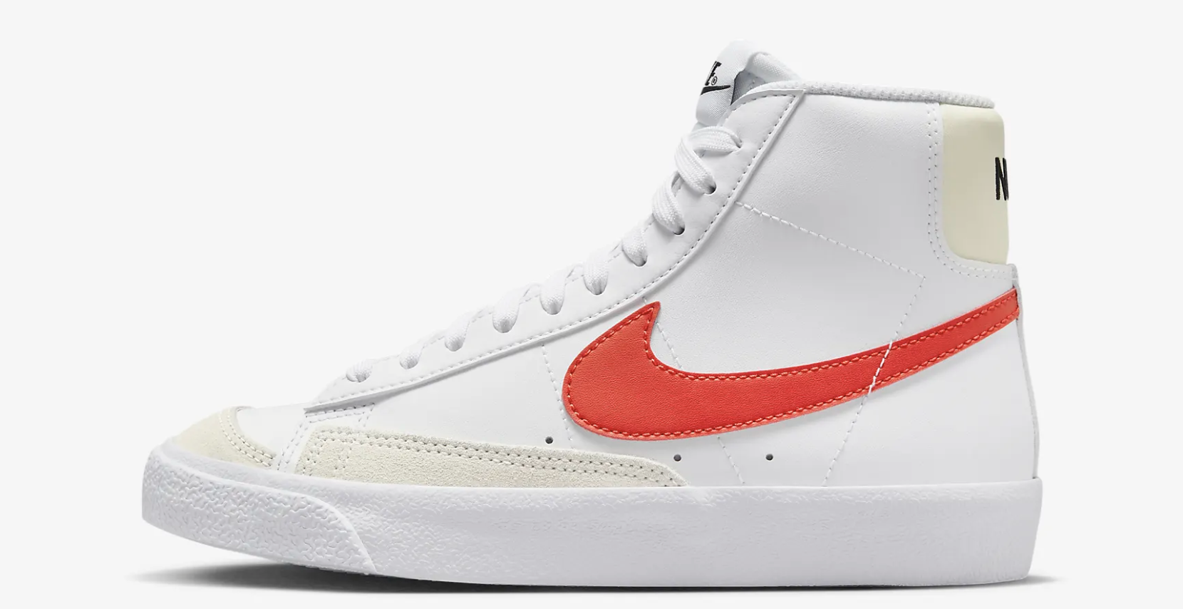 Nike Blazer Mid 77 Big Kids Shoes white Nike sneaker with orange swoosh