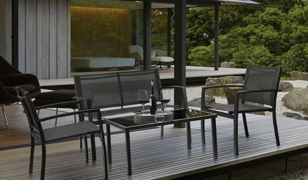 Onika 4 Piece Patio Conversation Set patio set on a deck