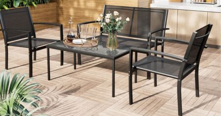 patio set with flowers on the table