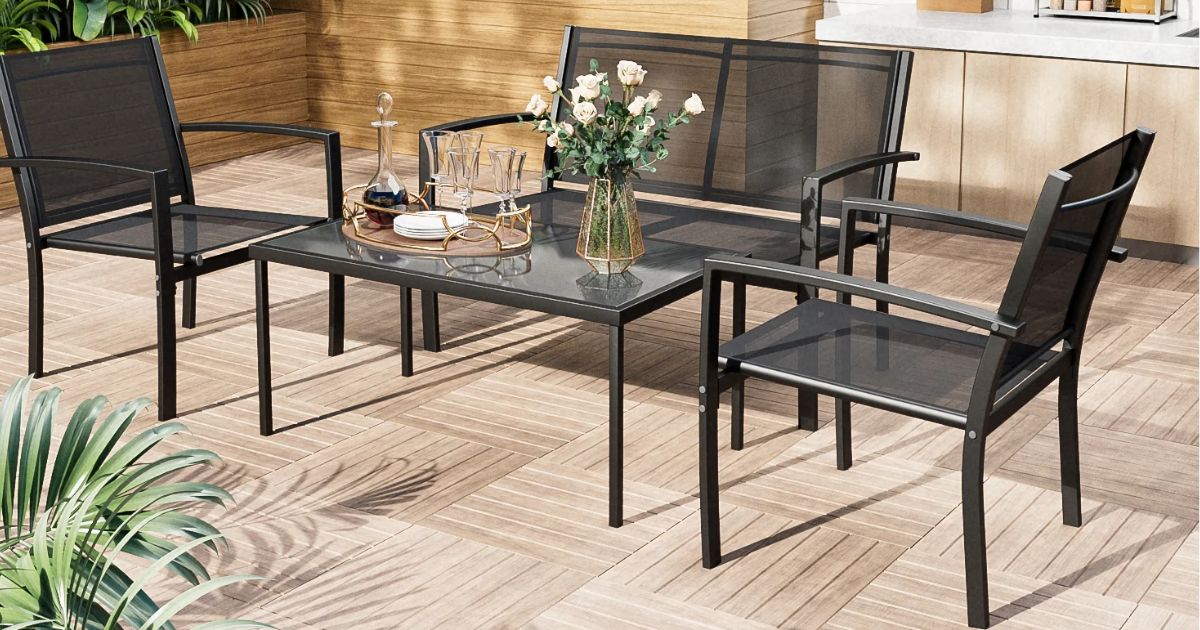 Patio Set patio set with flowers on the table