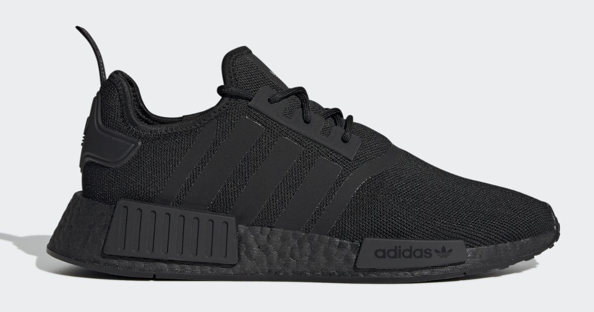 solid black adidas nmd